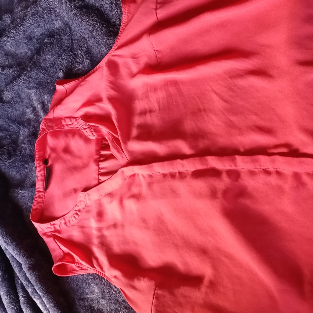 Pink sleeveless blouse